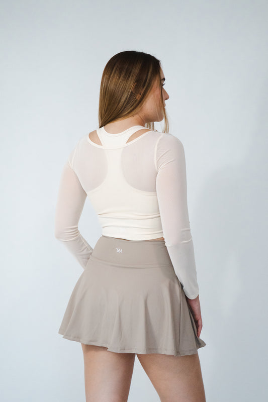 Top largo con mangas transparentes